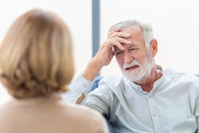 Senior couple looking distressed